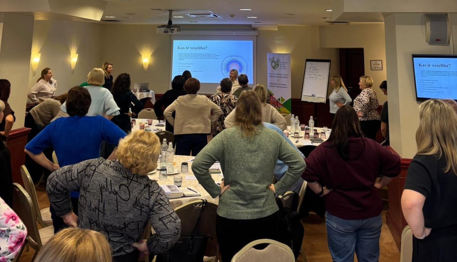 Pasākuma dalībnieki kustībā